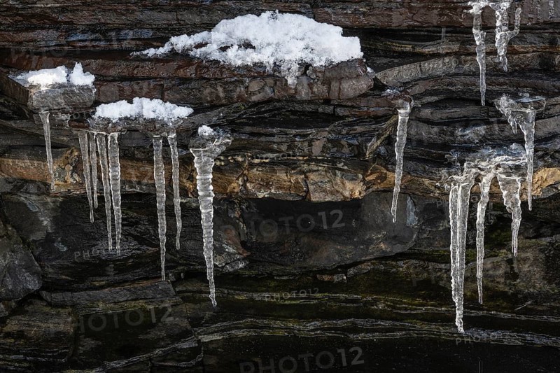 Icicles on rocks, Söröya, Finnmark, Norway, May 2019