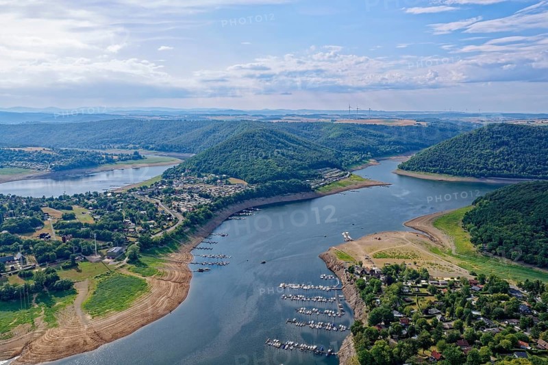 The Edersee, Eder Stausee, and the villages of Scheid and Rehbach in the Kellerwald-Edersee nature park Park in northern Hesse. aerial view. Edertal, Hesse, Germany