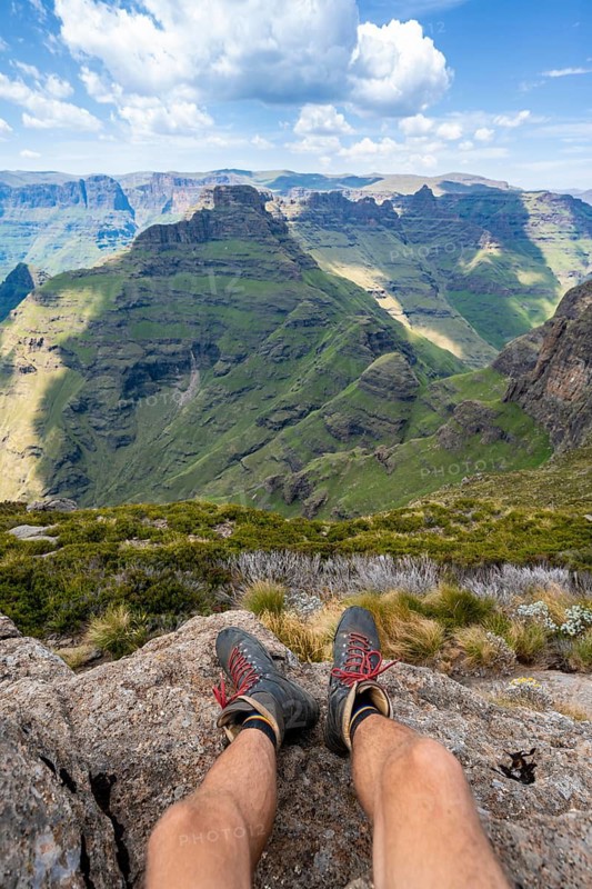 Hikers, mountain scenery of the Cathedral Range, view from Cathedral Peak or Cathedral Piek or Mponjwana, Drakensberg Mountains, KwaZulu-Natal, South Africa