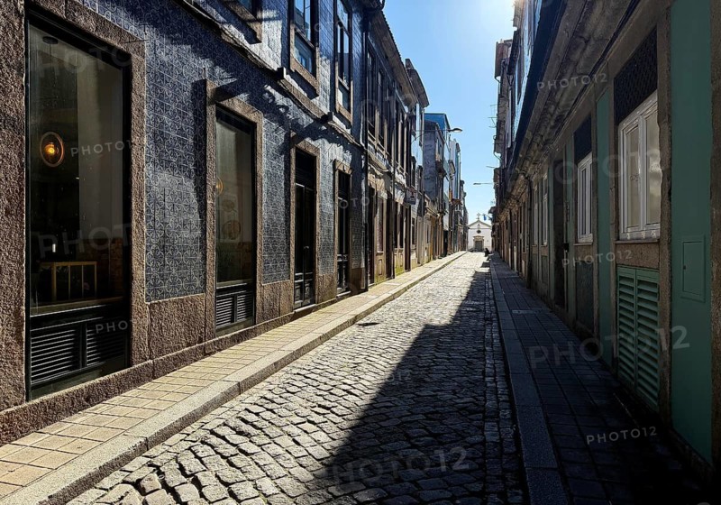 Rua do Pinheiro Street, a narrow and narrow typical street in the old town with the Capela de Nª Srª da Conceição da Quinta do Pinheiro at the end, Porto, Portugal