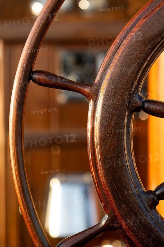 Detail of a teak steering wheel on a sailing ship, Aeolian or Aeolian Islands, Sicily, Southern Italy, Italy