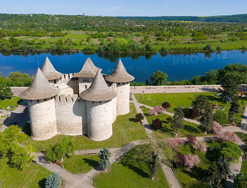 Castle with tall towers in a green landscape next to a river, aerial view, Soroca Fortress, Dniester River, Nistru, opposite Ukraine, Republic of Moldova, Moldova