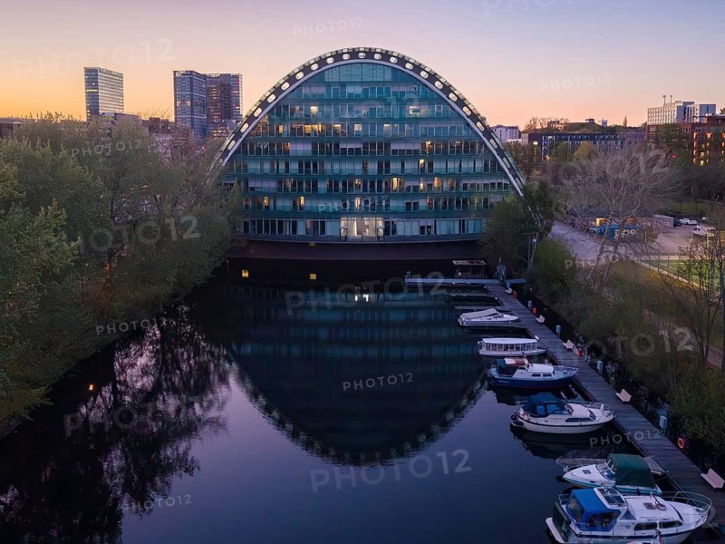 Aerial view of the BBCC Berliner Bogen Conference Center and the city of Hamburg at blue hour with Bille flood basin in the foreground, Hammerbrook, Hamburg, Germany