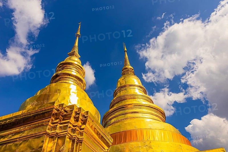Gilded temple towers, chedi, stupas, in the Wat Phra Singh Buddhist temple complex, Chiang Mai Old City Center, Chiang Mai Province, Thailand