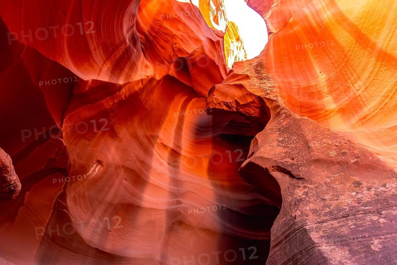 Antelope canyon slot canyon forming unique swirling sandstone wall textures creating vibrant patterns and colors in the narrow geological formation in northern arizona