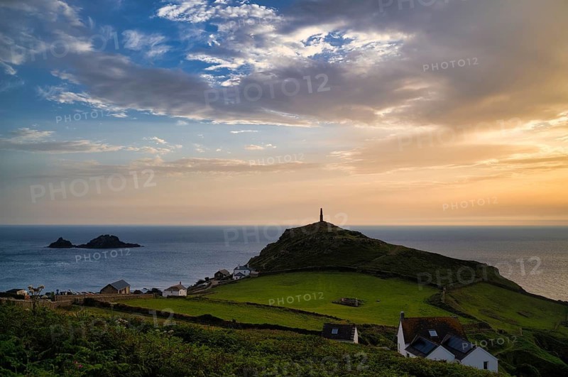 Chimney of a former mine, tin mine, copper mine, in memory of mining, Cape Cape Cornwall, behind rock formation, island, The Brisons, sea, evening, sunset, St Just in Penwith, Cornwall, England, Great Britain, Great Britain