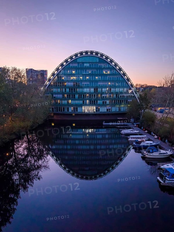Aerial view of BBCC Berliner Bogen Conference Center at blue hour with Bille flood basin in the foreground, Hammerbrook, Hamburg, Germany