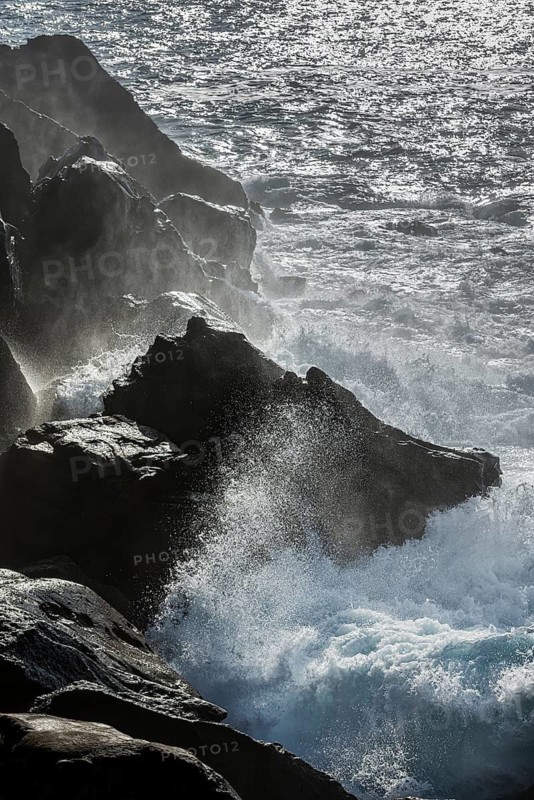Thundering surf from the Atlantic Ocean on the rocky coast in San Sebastian, Basque Country, Spain
