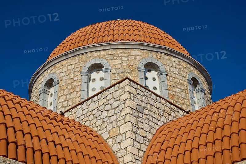 Agiou Sarvas monastery, Agion Pandon church, close-up of a church with orange stone dome and blue accents, Pothia, main town, port, Kalymnos, Sponge Diving Island, Dodecanese, Greek Islands, Greece