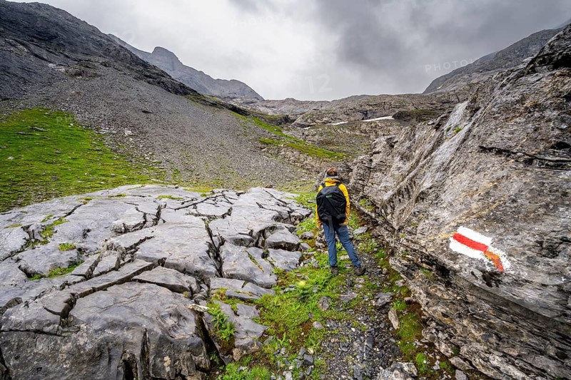Mountaineers on a hiking trail, Rote Härd climb, Bernese Alps, Bernese Oberland, Switzerland