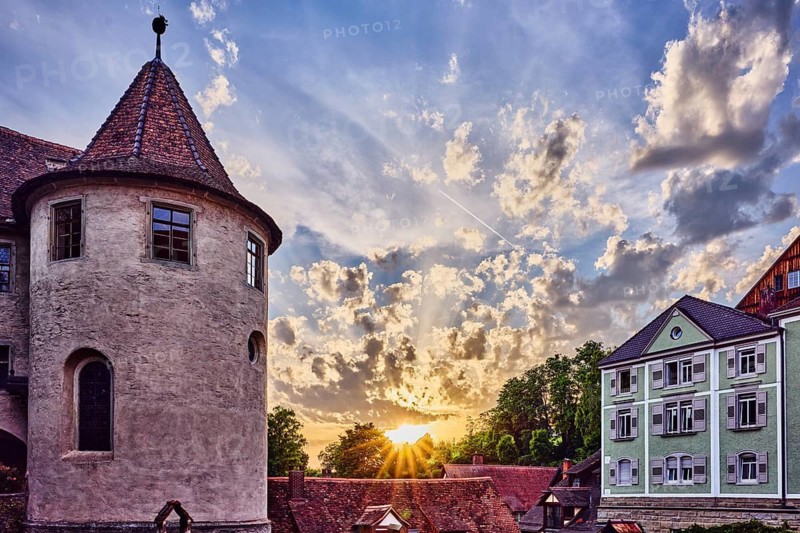 Old town, historic buildings, Meersburg Castle, round tower, roofs, wall, elevated perspective, evening light, back light, sunset, dramatic image processing, blue sky, cumulus clouds, cirrus clouds, climbing road, Meersburg, Lake Constance, Lake Constance, Baden-Württemberg, Germany