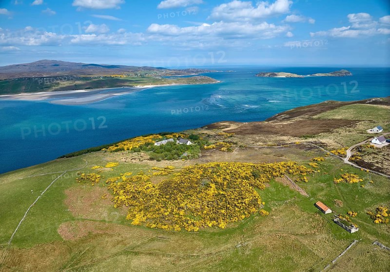 Aerial photo of a bay with golden sand beach at the scottish atlantic coast near Coldbackie, Scotland, UK