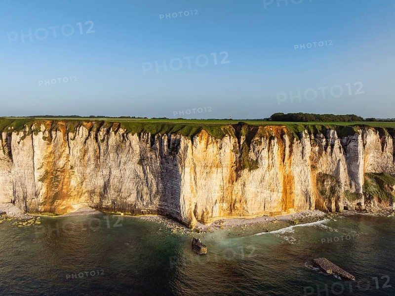 Aerial view of rugged chalk cliffs in the evening sun, Étretat, Alabaster Coast, La Côte d'Albâtre, chalk cliffs, English Channel, Seine-Maritime, Normandy, France