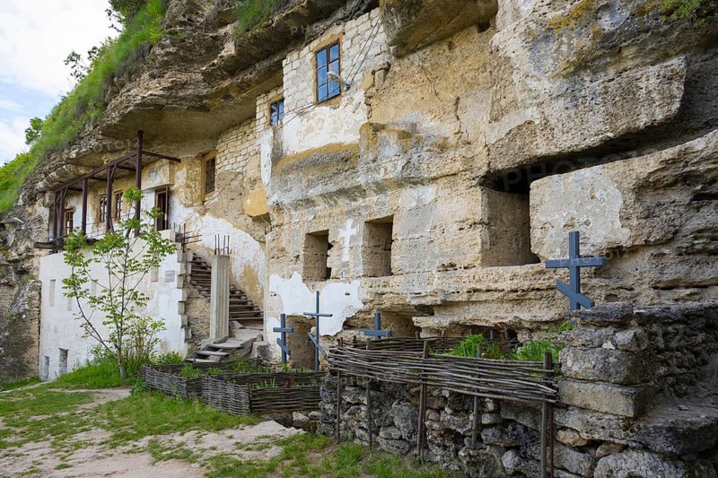 Old monastery entrance carved in rock, with crosses and a stone staircase, rock caves, cave dwellings, ?ipova monastery, Uspenski monastery, Tipova, Rezina region, Republic of Moldova, Moldova