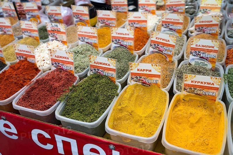 A variety of colorful spices in plastic containers with detailed signs, Pia?a Centrala, Piata Centrala, Central Market, Chisinau, Chisinau, Chisinau, Republic of Moldova, Moldova, Eastern Europe