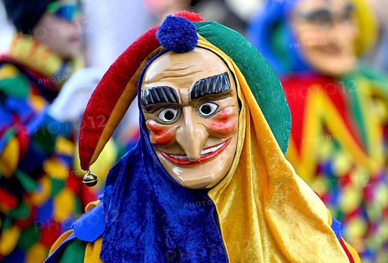 Member of a fools' guild in traditional Haes, fools' clothes, during the carnival procession in Achern, Ortenaukreis, Baden-Württemberg, Germany