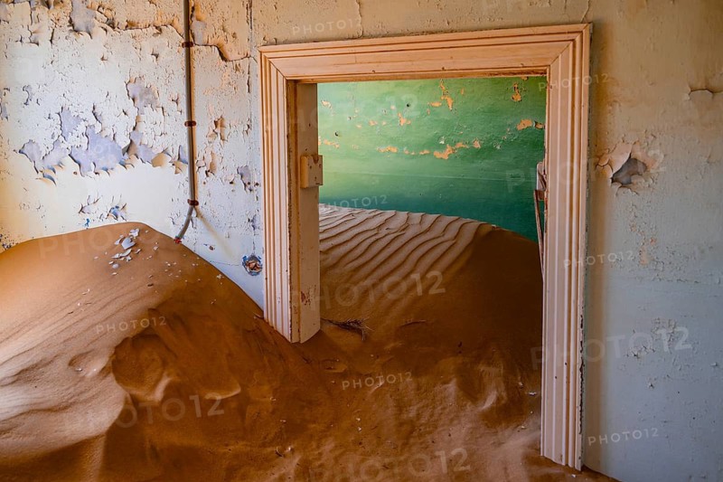 Interior view, doors and house full of sand, former diamond mining town, Namib Desert, Kolmanskop, Karas, Namibia