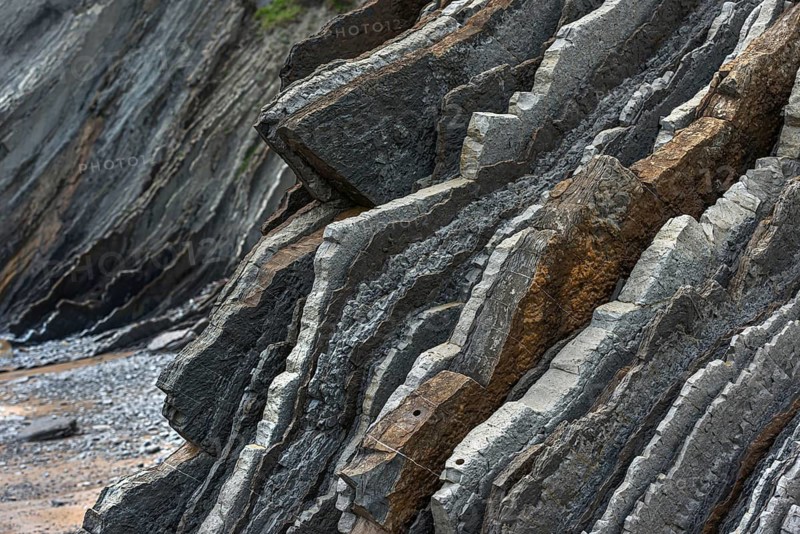 Geological formation of sandstone and limestone layers, Flysch on Itzurun Beach in Zumaia, Spain