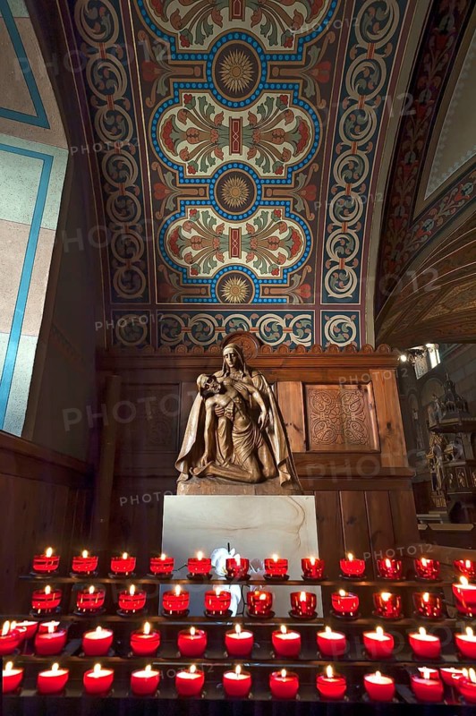 Marian altar with sacrificial candles in the monastery church, Cistercian Abbey Klosterstift St. Marienthal an der Neisse, gergr.1234, oldest woman's monastery of the order in Germany, Upper Lusatia, Saxony, Germany