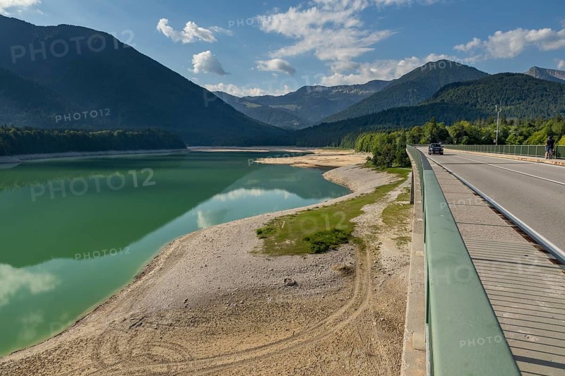 Lake, mountain lake, mountains, reflection, sunny, drought, low tide, drought, climate change, back light, bridge, road, car, August 2026, Sylvenstein Dam, Sylvensteinsee, Isar, Lenggries, Bavarian Alps, Bavaria, Germany