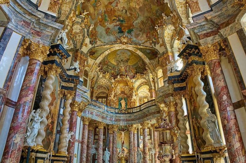 Magnificent baroque hall with gilded decorations and ornate frescoes on the ceiling, Hofkirche, Würzburg Residence, Würzburg, Bavaria, Germany