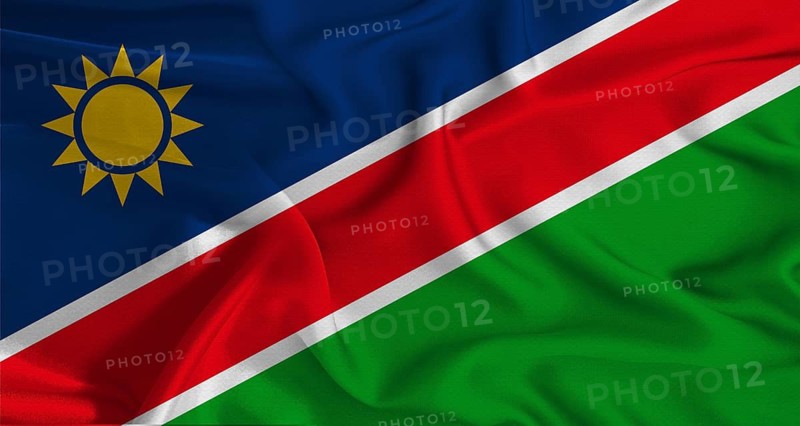 Colorful flag of Namibia with a silky fabric texture waving. Realistic Namibia flag waving
