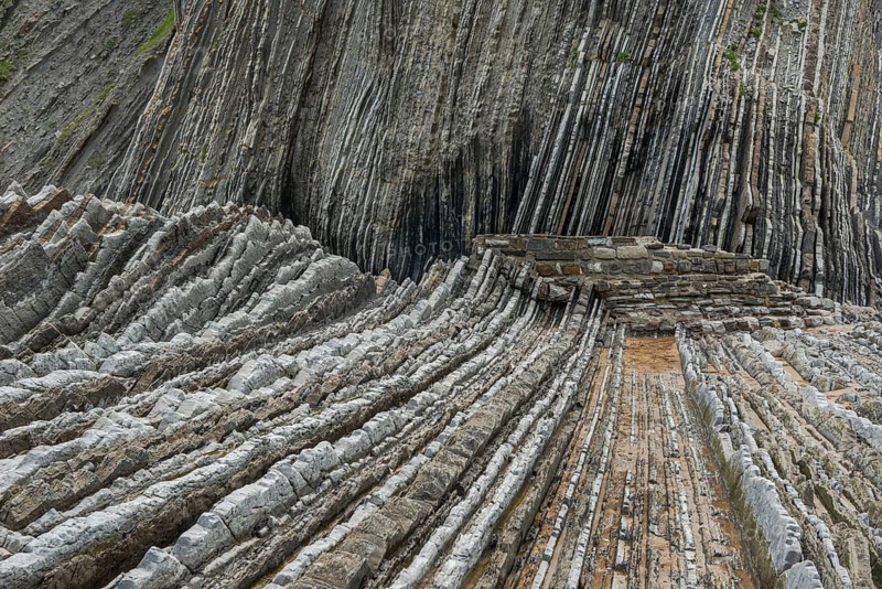 Geological formation of sandstone and limestone layers, Flysch on Itzurun Beach in Zumaia, Spain