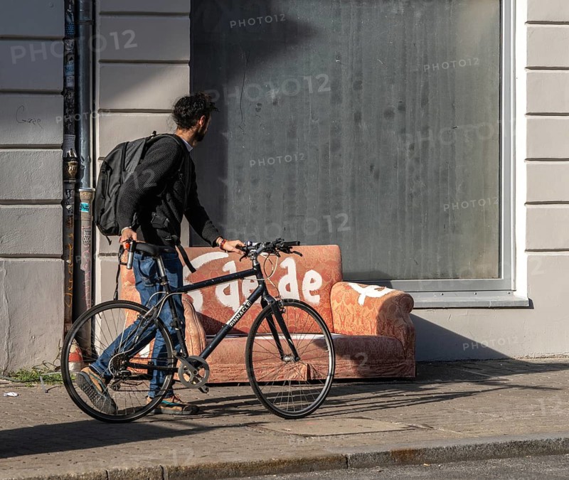Garbage parked on public roads, couch in orange, Neue Schönholzer Straße, Berlin, Germany