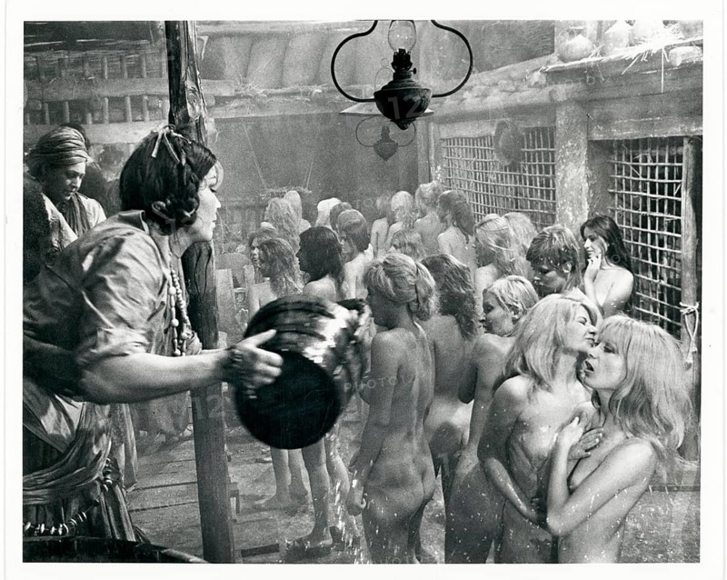 Blindman, The Executioner, film, western, USA, 1971, showers, ship, woman standing naked in a rustic setting, are protected with a bucket of water