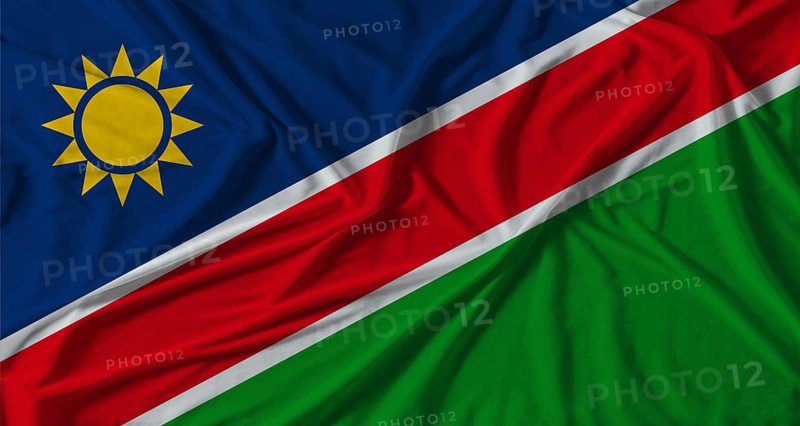 Namibia flag with fabric texture background. National flag of Namibia with cloth texture