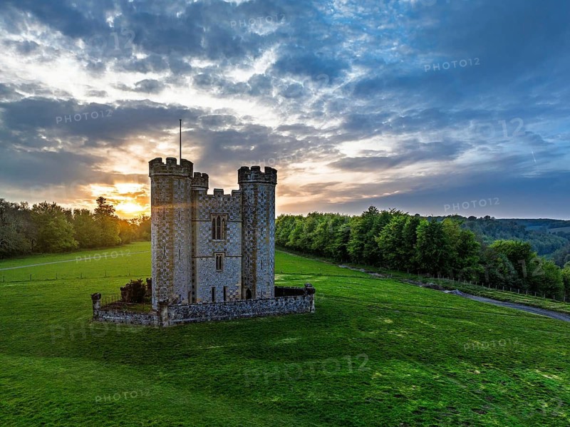 Sunset over Hiorne's Tower from a drone, Arundel, West Sussex, England, United Kingdom