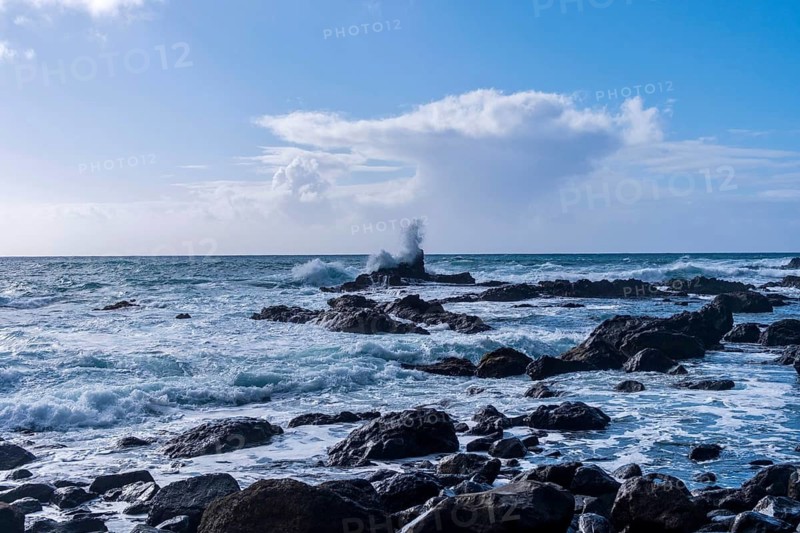 A wave breaks on a rock in the stormy Atlantic off Alojera, La Gomera, Spain