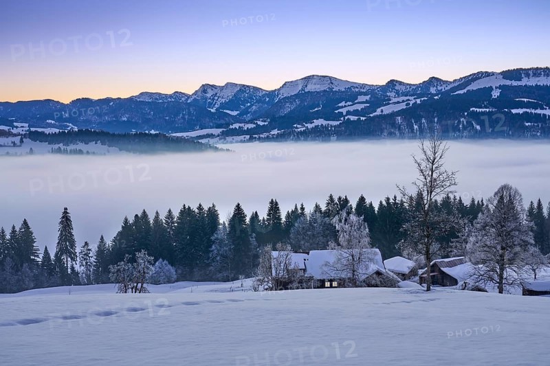 Moodx sunrise over the mountains of the Nagelfluh mountain chain in the Allgaeu Alps with Hochgrat summit, Oberstaufen, Bavaria, Germany