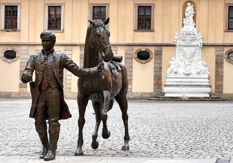 Life-size bronze sculpture, equestrian statue of the late reading rider by Valerie Otte in the courtyard of the city palace, Fulda, East Hesse, Hesse, Germany