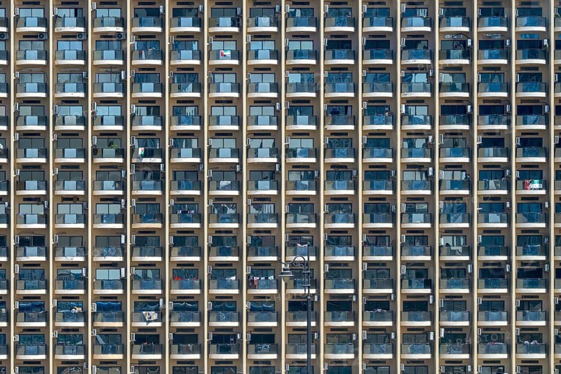Apartment block with balconies and air-conditioning units, Dubai, United Arab Emirates, UAE