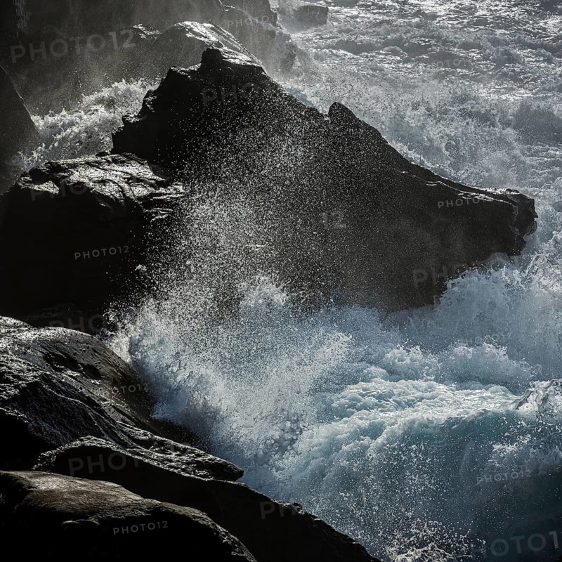 Thundering surf from the Atlantic Ocean on the rocky coast in San Sebastian, Basque Country, Spain