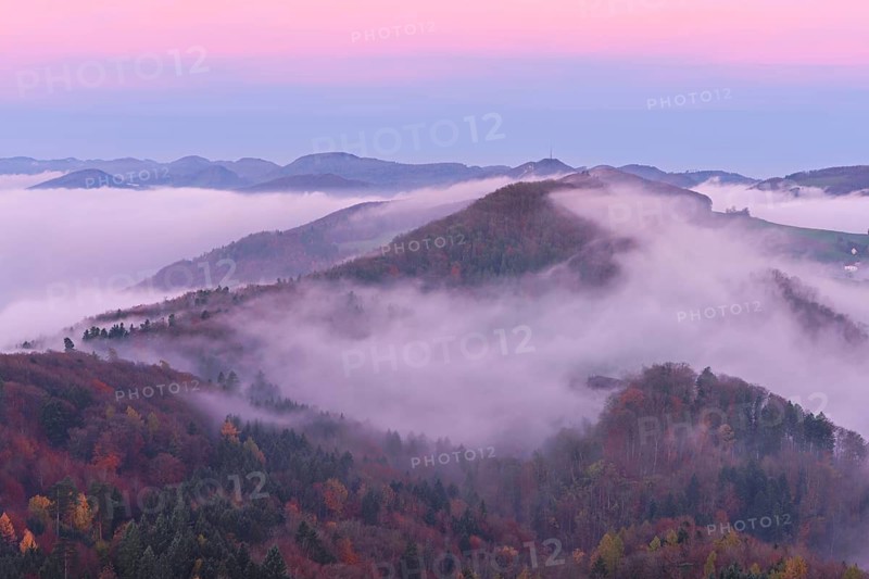 View from the Gisliflue of the Jurassic foothills covered in fog with the water fluh in the light of dawn, Talheim, Canton, Aargau, Switzerland