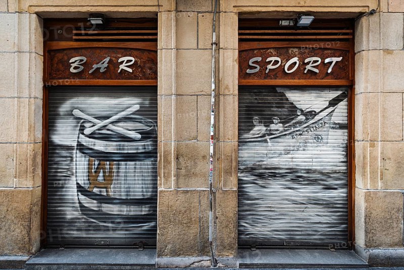 Typical Spanish art graffiti at a bar in the old town of San Sebastian, Spain