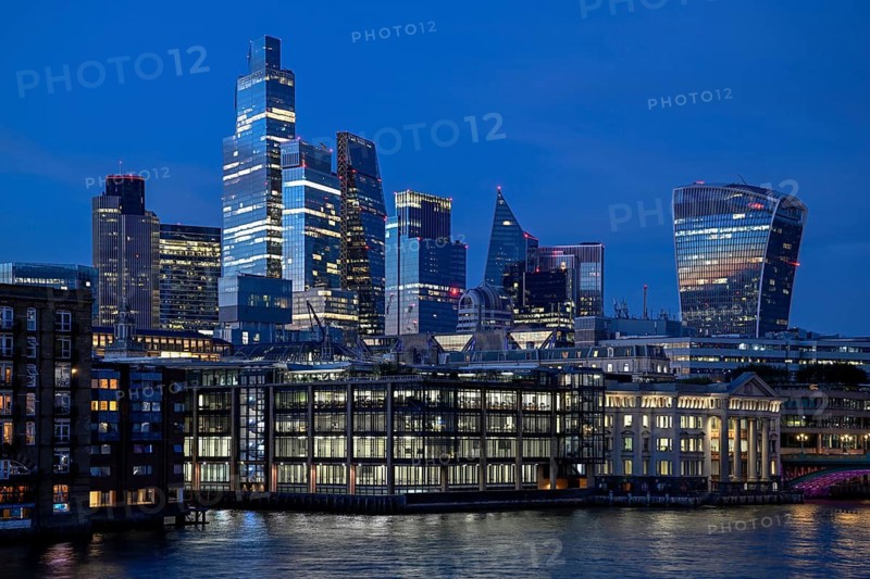 City of London skyline with skyscrapers 22 Bishopsgate, Leadenhall Building, Cheesegrater, and 20 Fenchurch Street, walkie talkie, on the Thames, blue hour, London, England, Great Britain, Great Britain