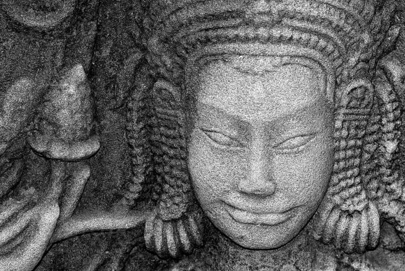 Stone Buddha, head, wall, Khmer, Angkor Wat temple, Siam Reap, Cambodia