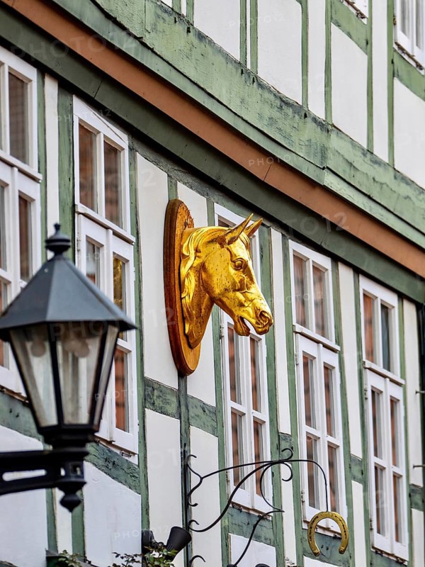 Golden horse head on a half-timbered house in Keßlerstraße, Hildesheim, Germany