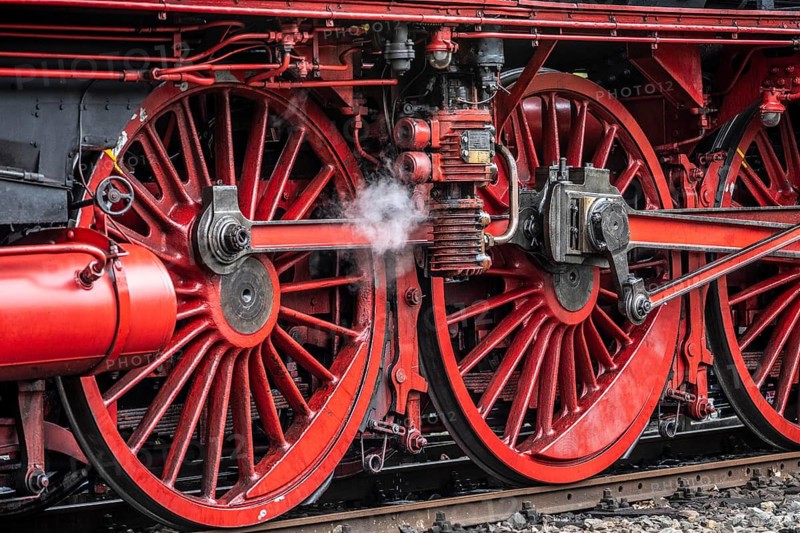 Detailed view of the drive wheels and coupling rods of a steam locomotive, Bochum railway museum, museum days weekend, with many attractions such as steam locomotive rides, 3 locomotives are under steam, historic trains make round trips through the Ruhr Valley, many locomotives can be visited, on the site of the former Dahlhausen railway depot, North Rhine-Westphalia, Germany