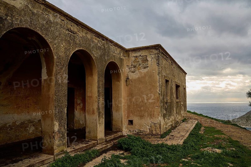 Ruins of an old building with arches and weathering, sea view in the background, Lost Place, Tourtouras Mountain, WW2, World War II, German Coast Battery PL 388, Marine Artillerists, Diapori, Xirokambos, Leros, Dodecanese, Greek Islands, Greece