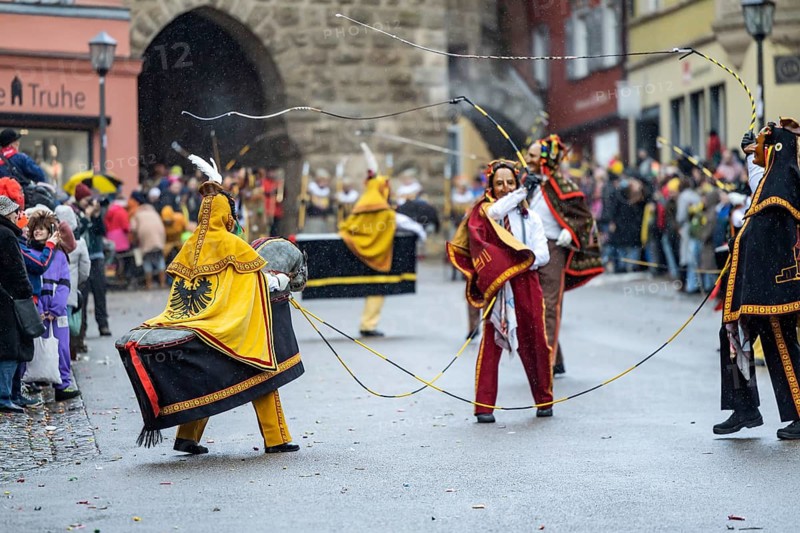 The highlight of the Swabian-Alemannic carnival is the fool's jump in Rottweil. Around 4000 fools jump through the historic Black Gate. Only fools with the certified original Rottweiler fool dress may participate. Rottweil, Black Forest, Baden-Württemberg, Germany