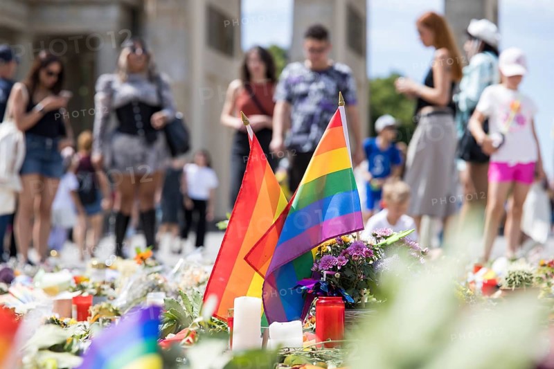 Rainbow flags in an improvised memorial made of flowers and candles on Pariser Platz in front of the Brandenburg Gate in Berlin on 29.07.2026. During the closing Christopher Street Day rally on July 25, 2026, a gunman with a van in Berlin's Tiergarten killed at least one participant and injured several others, some seriously