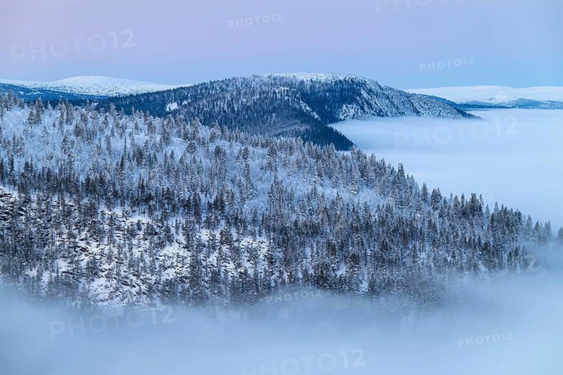 Snowy mountain ranges over fog-filled valley, Alvdal Vestfjell, Hedmark, Innlandet, Norway, January 2026