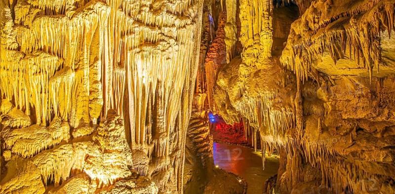 Illiuminated prometheus cave and pathway. Travel spots and sightseeing in Georgia
