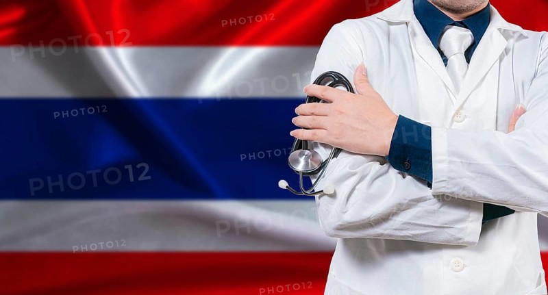 Thai national health system, Medical professional holding sthetoscope isolated