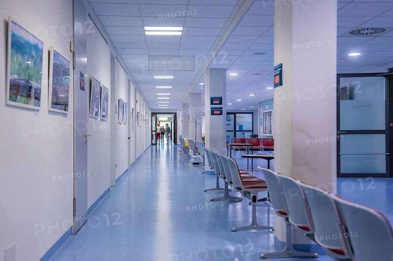 Long hospital corridor with chairs and bright, sterile light, Integrated Health Center of the Southwest Clinic Network, Herrenberg, Germany