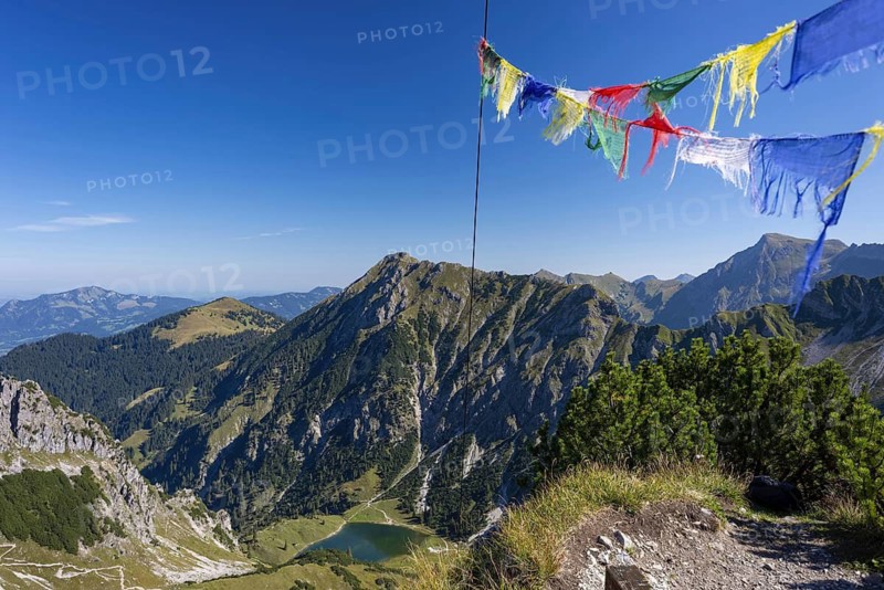 Panorama from the summit of Geissalphorn, 1953m, prayer flags flying at the summit cross, Unterer Gaisalpsee, behind it the Entschenkopf, 2043m, Allgäu Alps, Allgäu, Bavaria, Germany